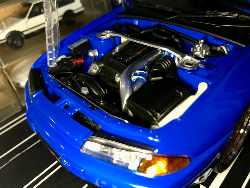 Note the radiator fan assembly behind the front fascia.